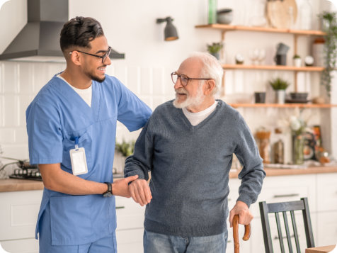 elderly man with a caregiver